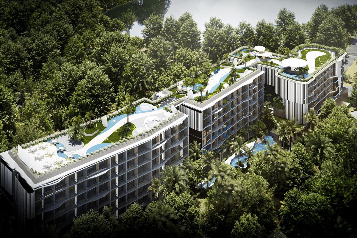 Vega Condominium — aerial view of the residential complex surrounded by greenery