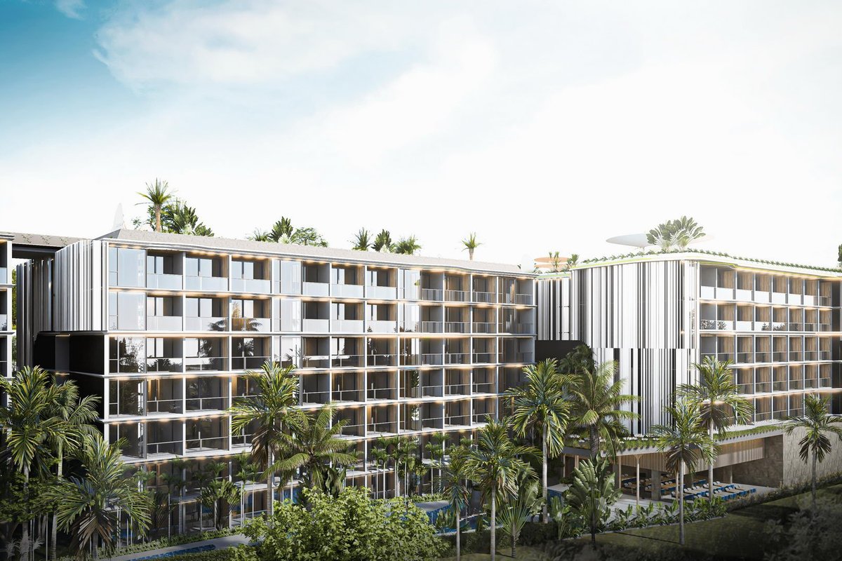 Vega Condominium — building facade with terraces and tropical landscaping